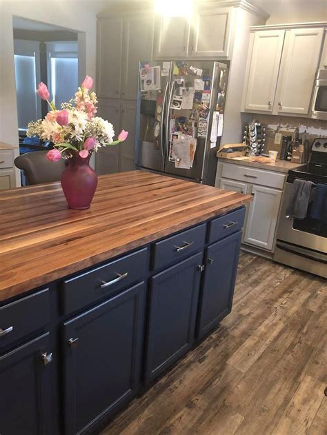 navy cabinets with butcher block
